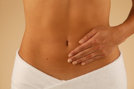 Model holding stomach